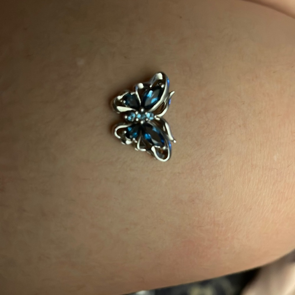 Blue topaz/ white gold butterfly pendant